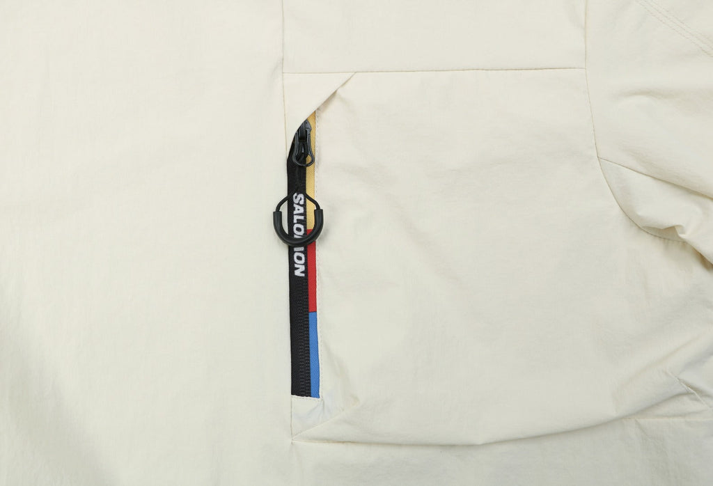 Salomon Racing Flag Zip Pocket Short Sleeve Tee — Beige