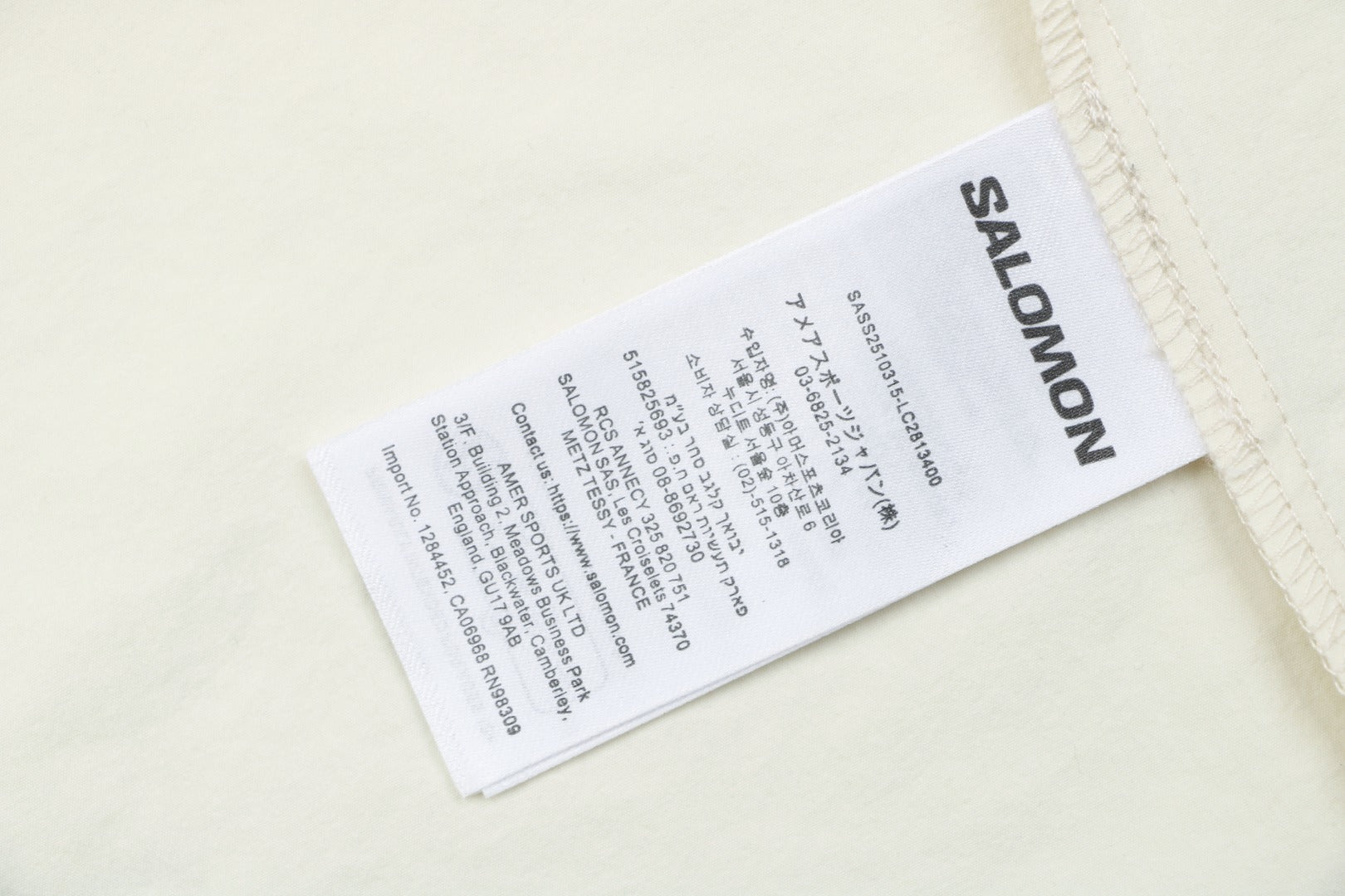 Salomon Racing Flag Zip Pocket Short Sleeve Tee — Beige