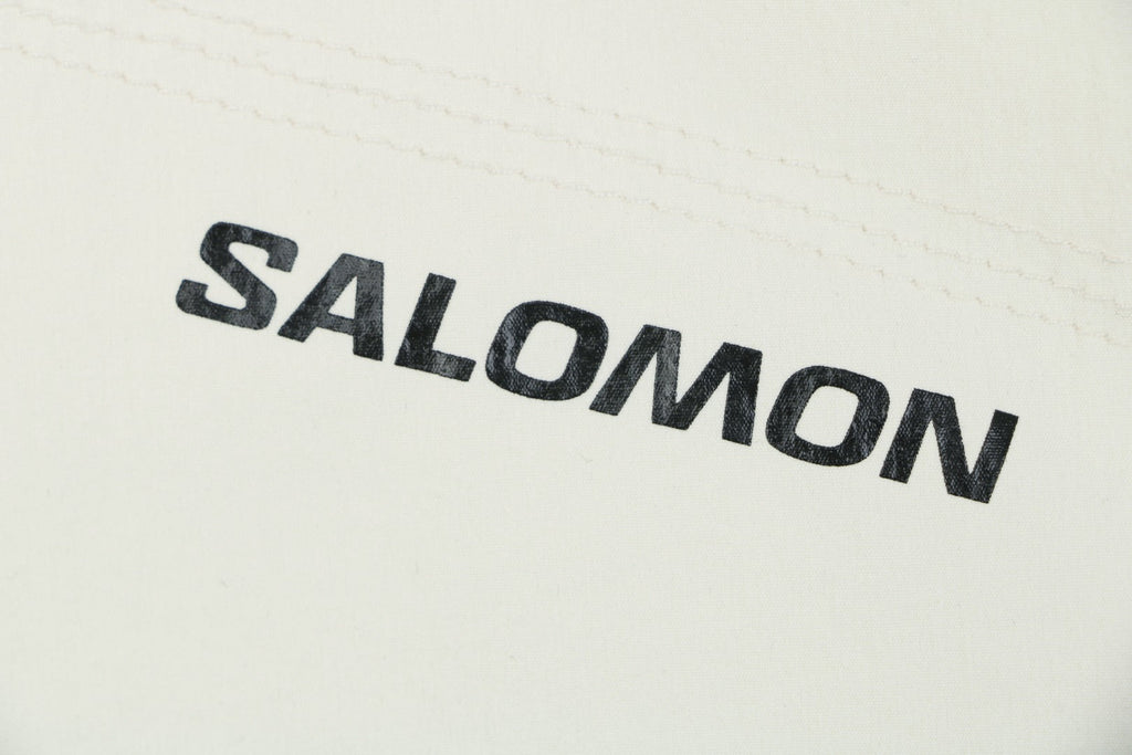 Salomon Racing Flag Zip Pocket Short Sleeve Tee — Beige