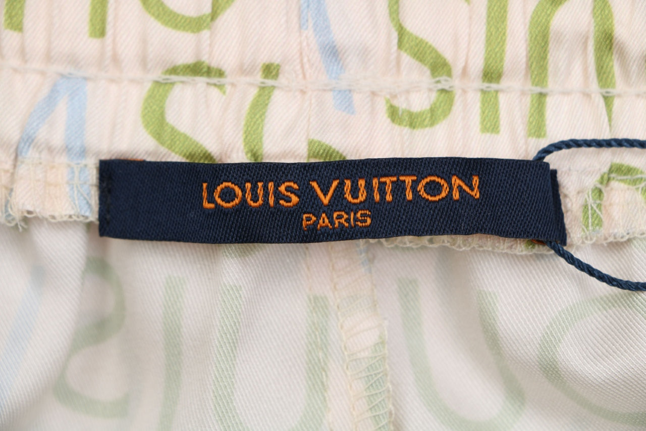 Louis Vuitton All-Over Monogram Letter Print Shorts — Cream / Green / Blue