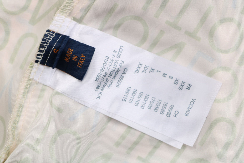 Louis Vuitton All-Over Monogram Letter Print Shorts — Cream / Green / Blue